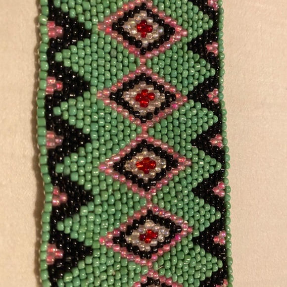 Handmade Huichol-style seed bead bracelet featuring green, black, pink & red. - Picture 5 of 6